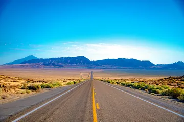 Nevada highway and mountain landscape representing a change of trust situs