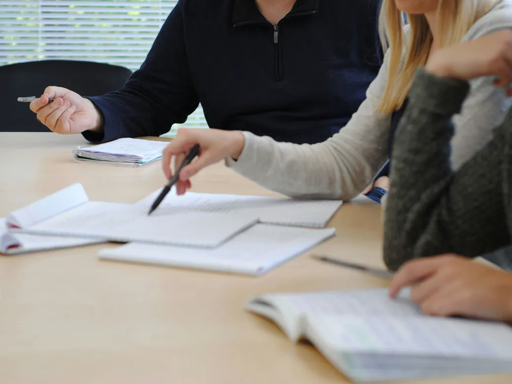 Beneficiary and fiduciary reviewing Nevada trust information