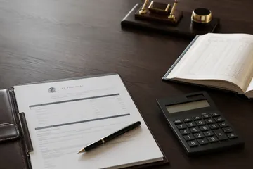 Calculator and planning documents representing Nevada trust costs and fees