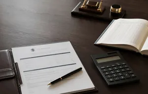 Calculator and planning documents representing Nevada trust costs and fees